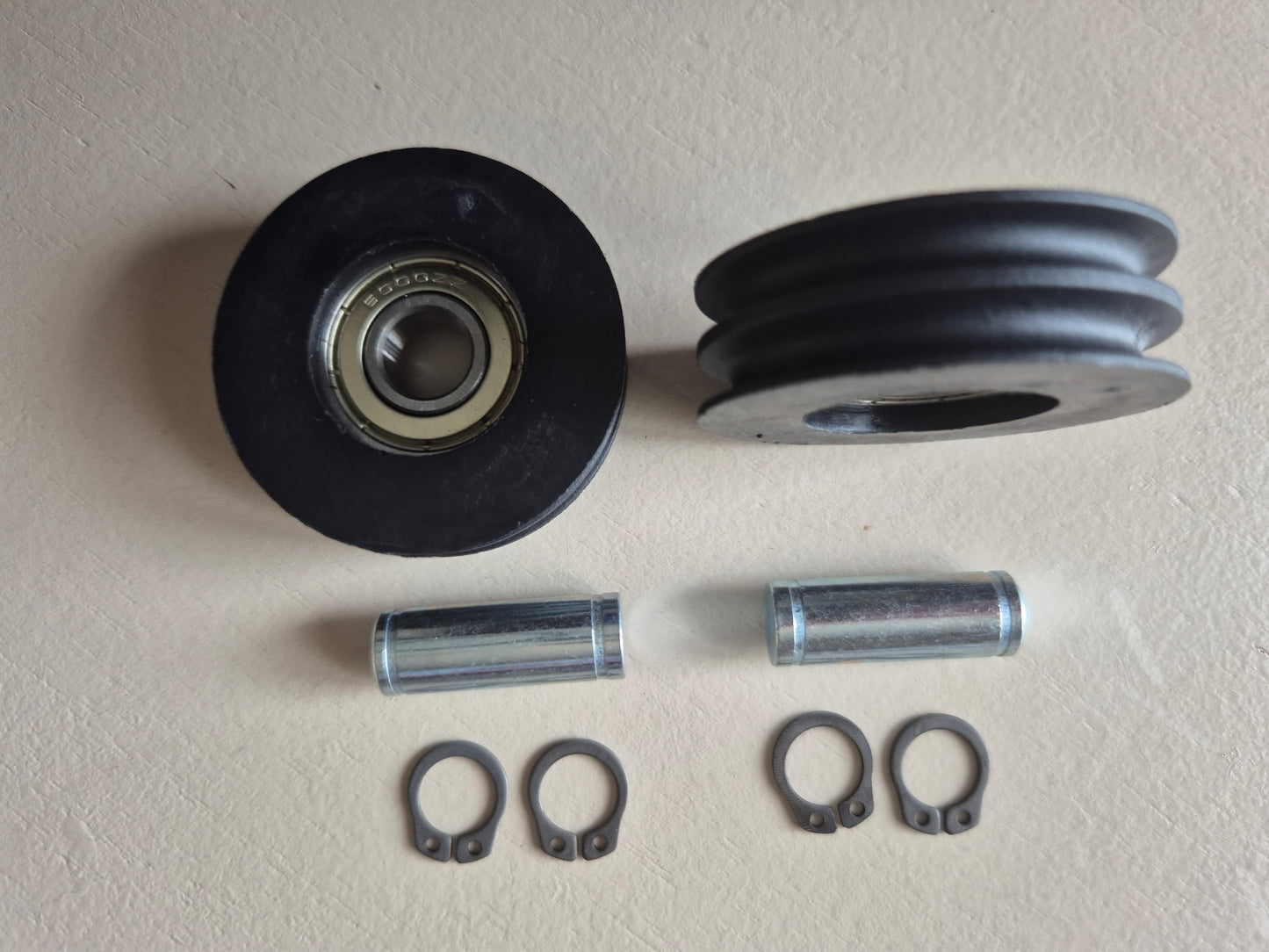 Roulettes pour ressorts de tension - Porte sectionnelle RSD01